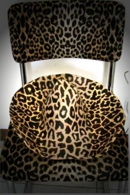 "Papier Mache Hat On Chair" by Arthur P. Espagne